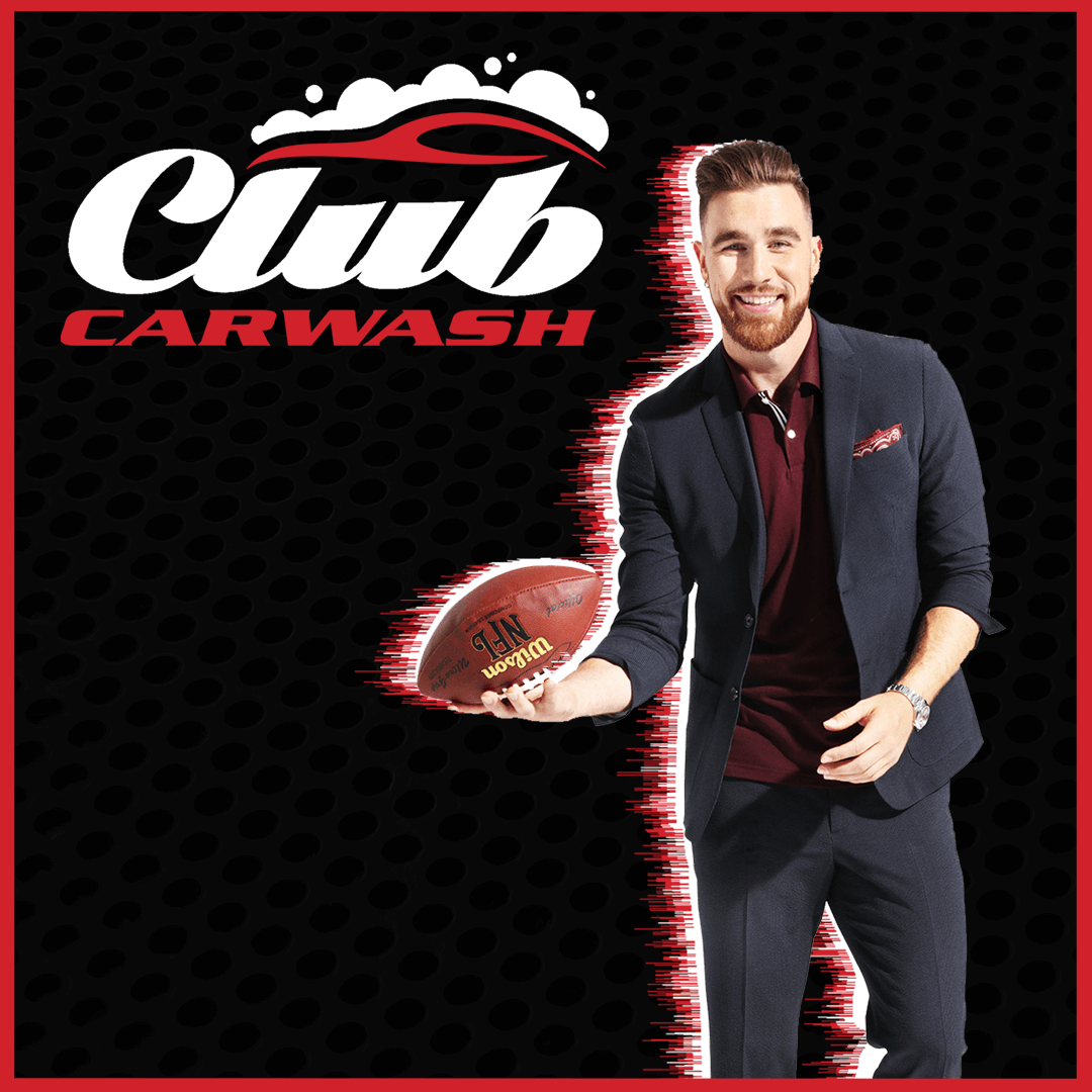 travis kelce holding football with club car wash logo